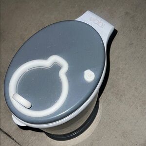 Gray and White metal smell proof baby diaper container